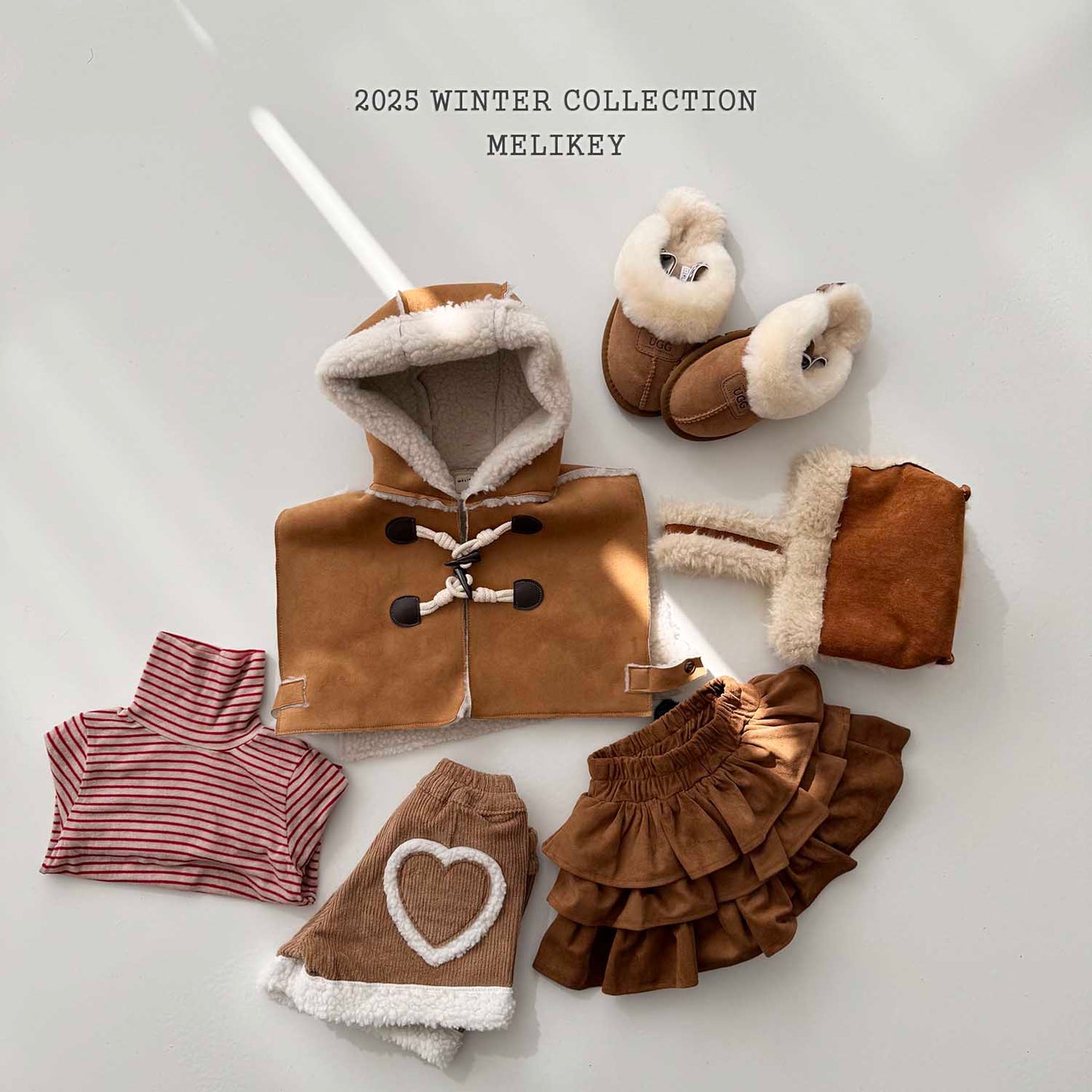 무스탕후드케이프