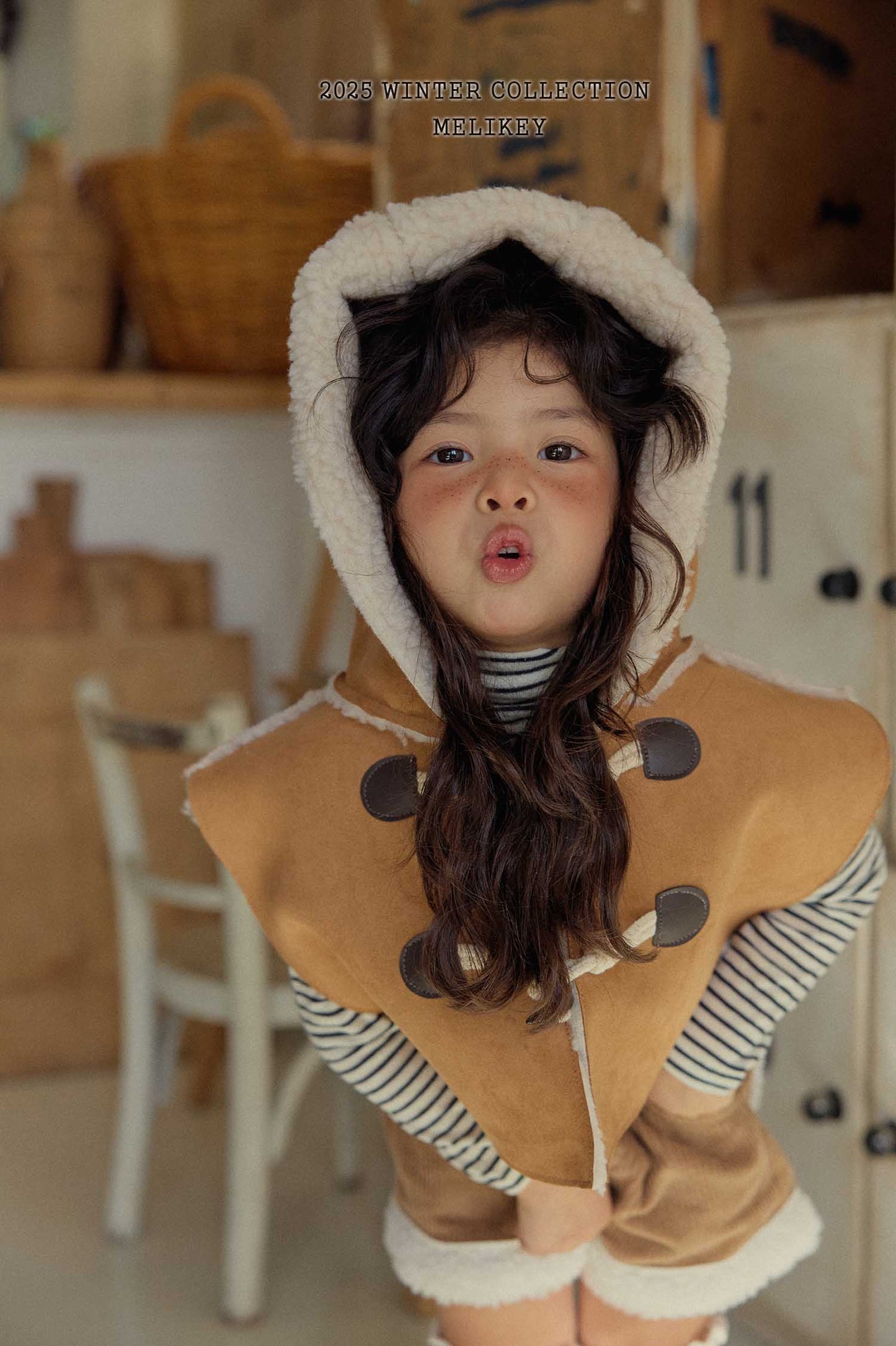 무스탕후드케이프