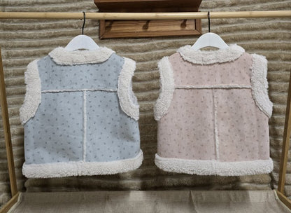 눈송이무스탕조끼