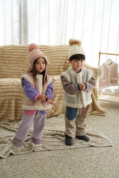 눈송이무스탕조끼