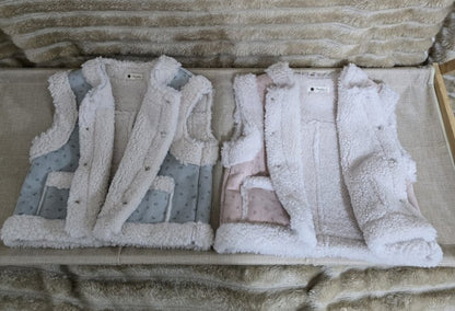 눈송이무스탕조끼