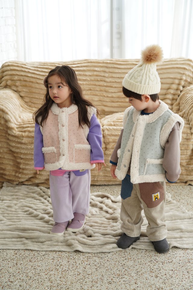 눈송이무스탕조끼