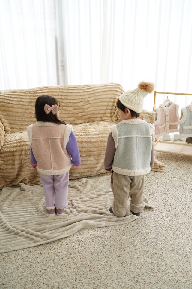 눈송이무스탕조끼